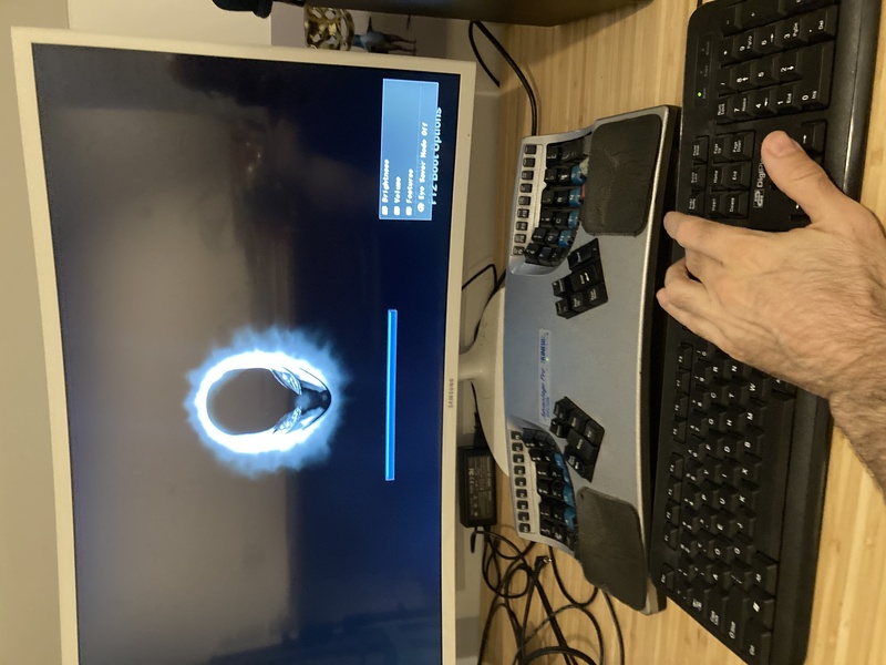 The Alienware startup logo on my screen The Alienware desktop starts up