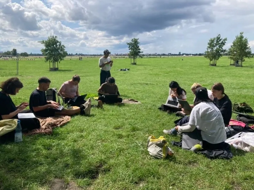 People coding in a field