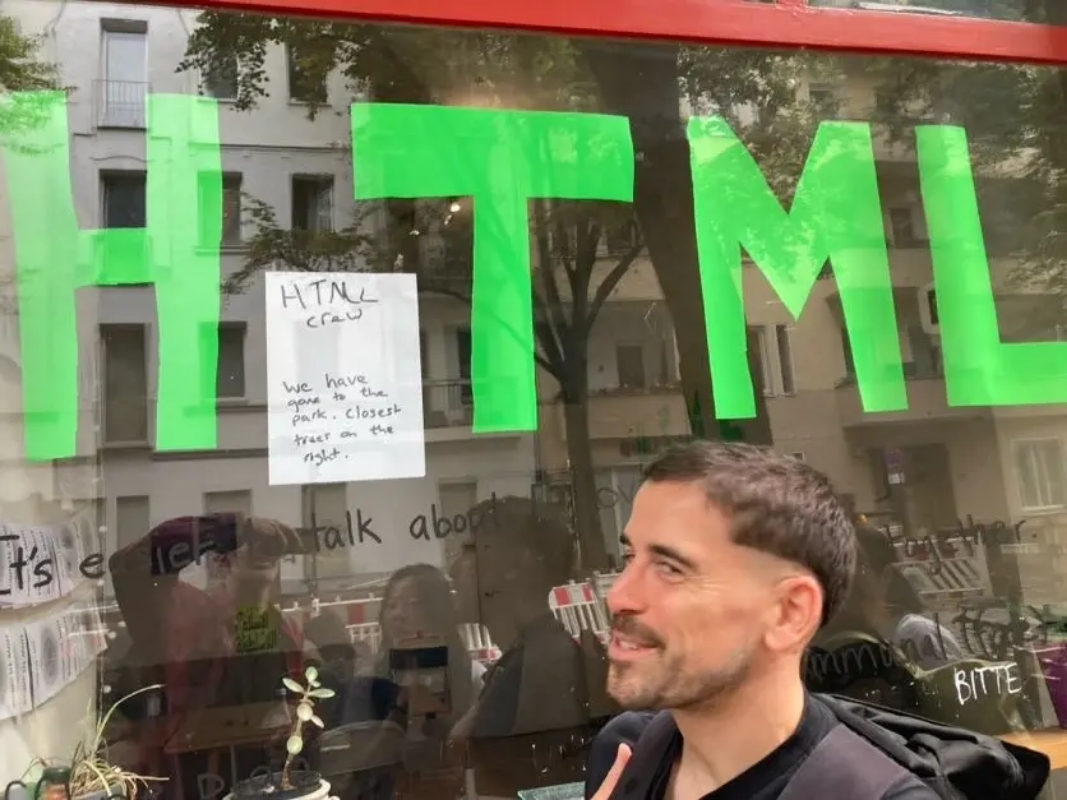 looking at the HTML sign on the window