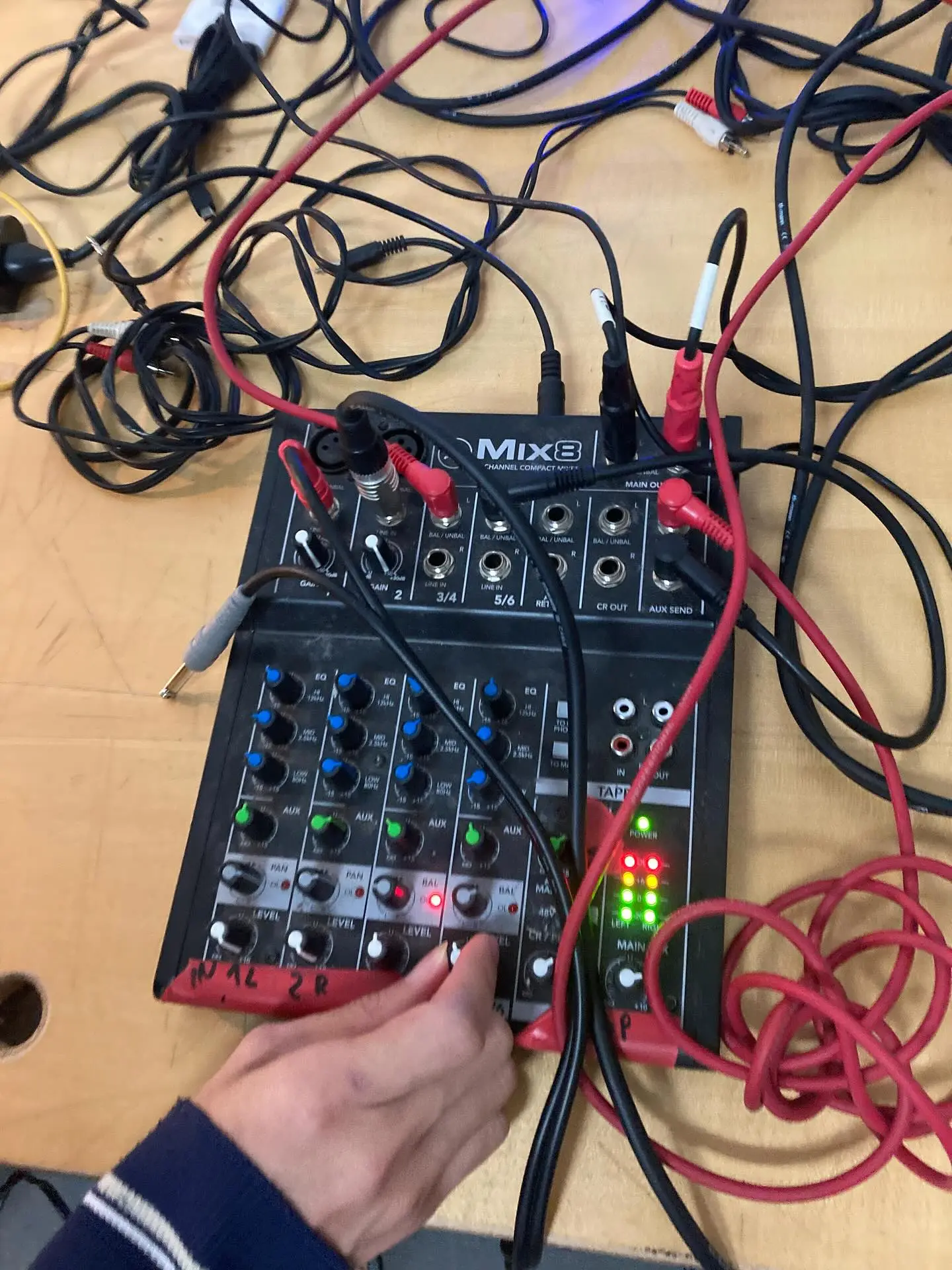 Zelin with our no input mixing board Zelin's hand on our No Input Mixing Board
