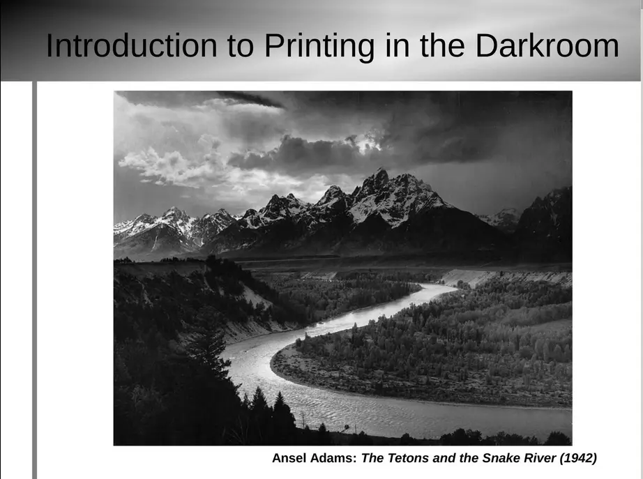 Introduction to Printing in the Darkroom over a light gradient and a black and white image below of mountains and river and clouds, labeled Ansel Adams: The Tetons and the Snake River (1942)