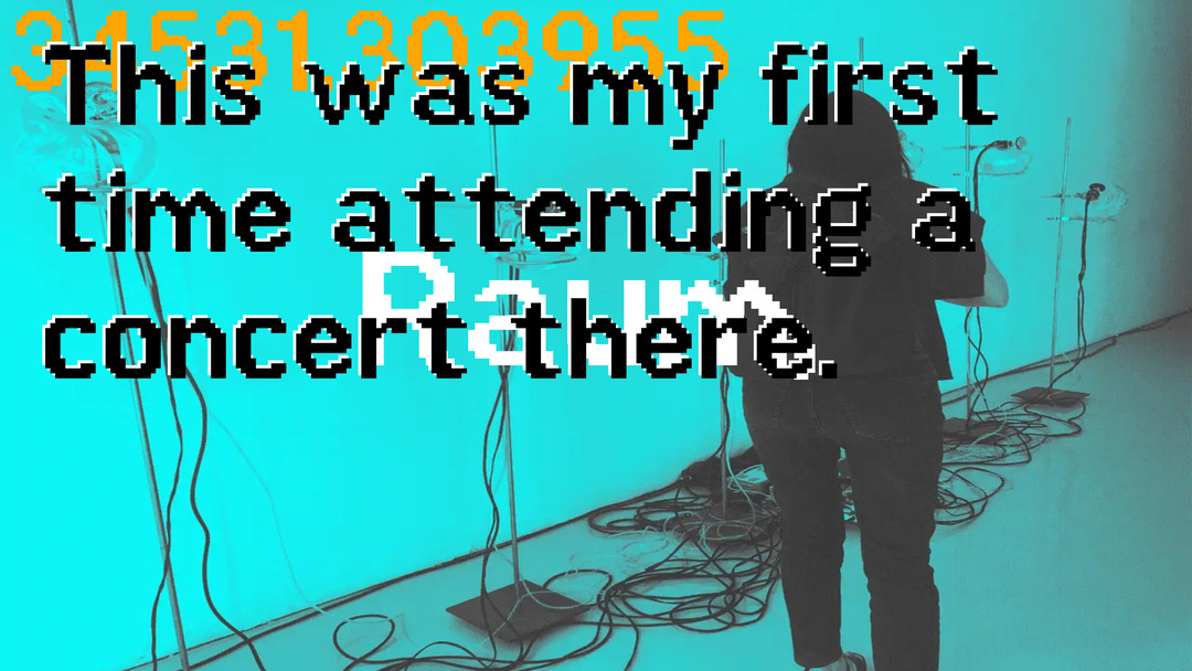 A silhouetted person looks at cables in a museum, with overlaid low resolution text