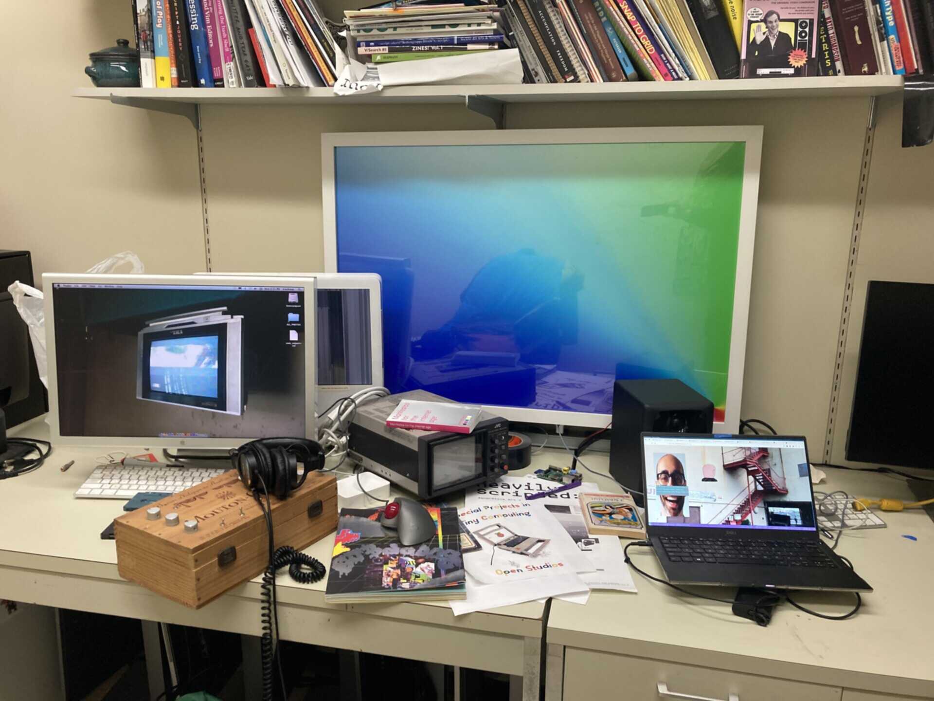 My messy desk with gaussian blur and 50% image quality